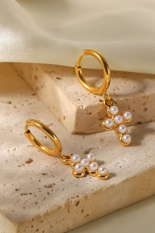 rowan: pearl cross huggie earrings